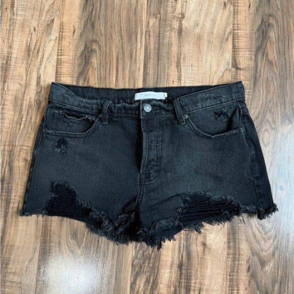 Hidden large dark denim shorts
Great condition! No flaws.  Size L.